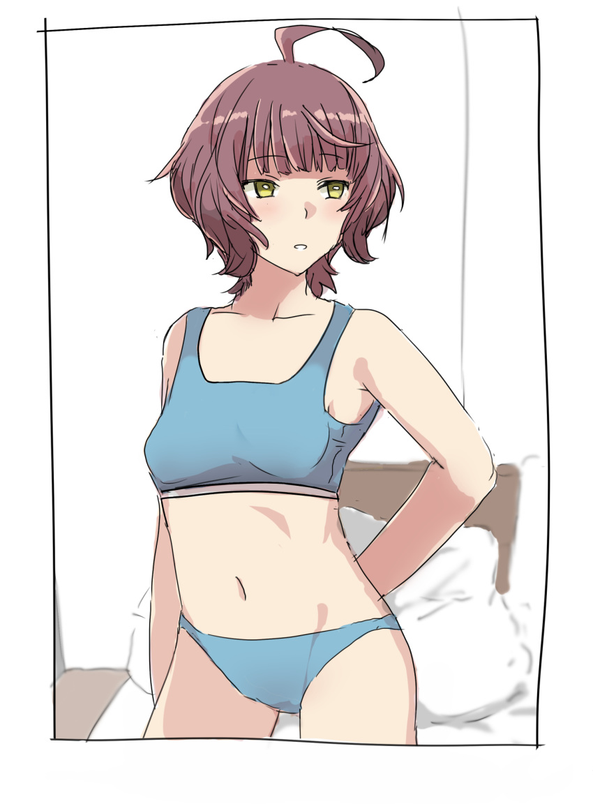 ahoge bed blue_panties blue_sports_bra blunt_bangs brown_eyes brown_hair collarbone contrapposto cowboy_shot dora_v_nu female highres kantai_collection kishinami_(kancolle) looking_to_the_side navel panties pillow short_hair solo sports_bra standing underwear underwear_only wavy_hair