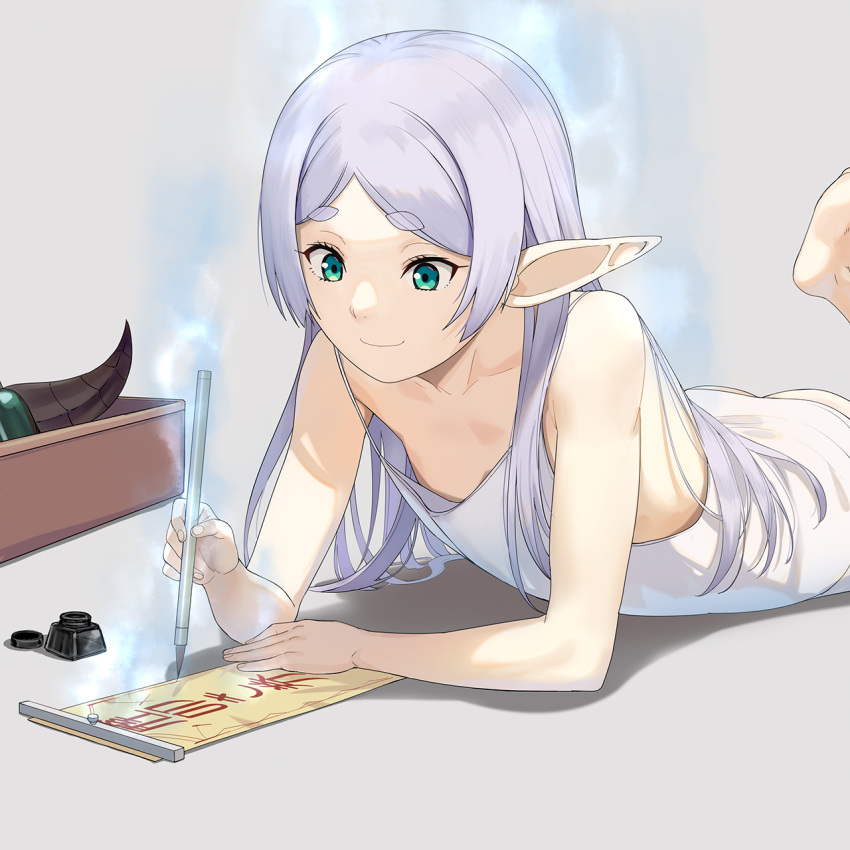 a1_(initial-g) aura calligraphy_brush closed_mouth commentary_request dress elf female flat_chest frieren green_eyes grey_background grey_hair highres holding holding_calligraphy_brush holding_paintbrush ink long_hair lying on_stomach paintbrush pointy_ears simple_background sleeveless sleeveless_dress smile solo sousou_no_frieren thick_eyebrows white_dress