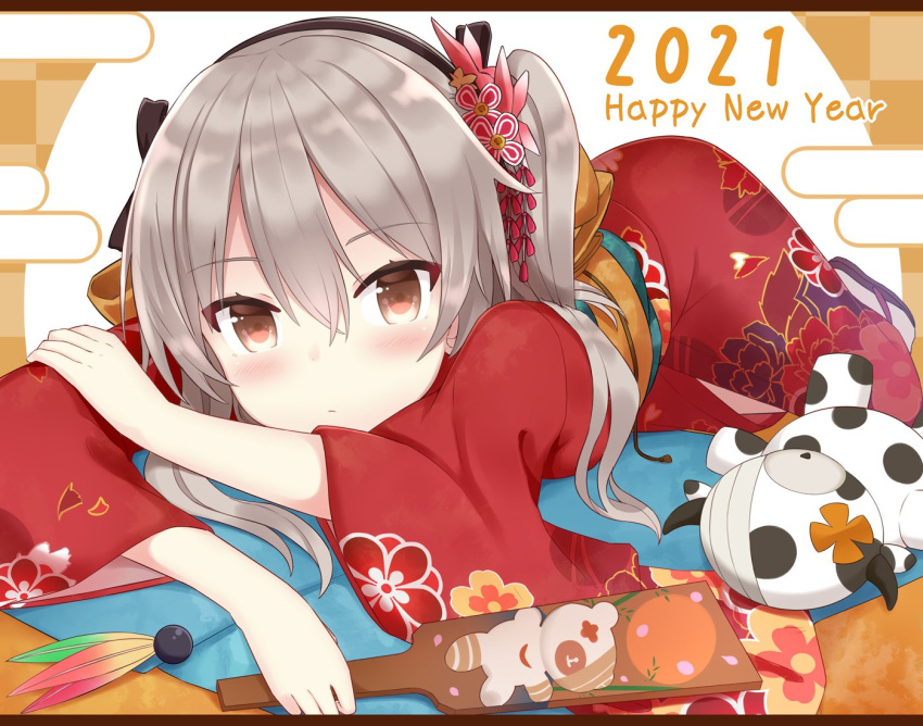 2021 bad_id bad_twitter_id black_ribbon blush boko_(girls_und_panzer) brown_eyes closed_mouth egasumi english_text female floral_print girls_und_panzer hagoita hair_ornament hair_ribbon hane_(hanetsuki) hanetsuki happy_new_year holding holding_paddle japanese_clothes kimono letterboxed light_brown_hair light_frown long_hair looking_at_viewer lying new_year obi on_stomach one_side_up paddle print_kimono red_kimono ribbon sash shimada_arisu shuuichi_(gothics) solo stuffed_cow