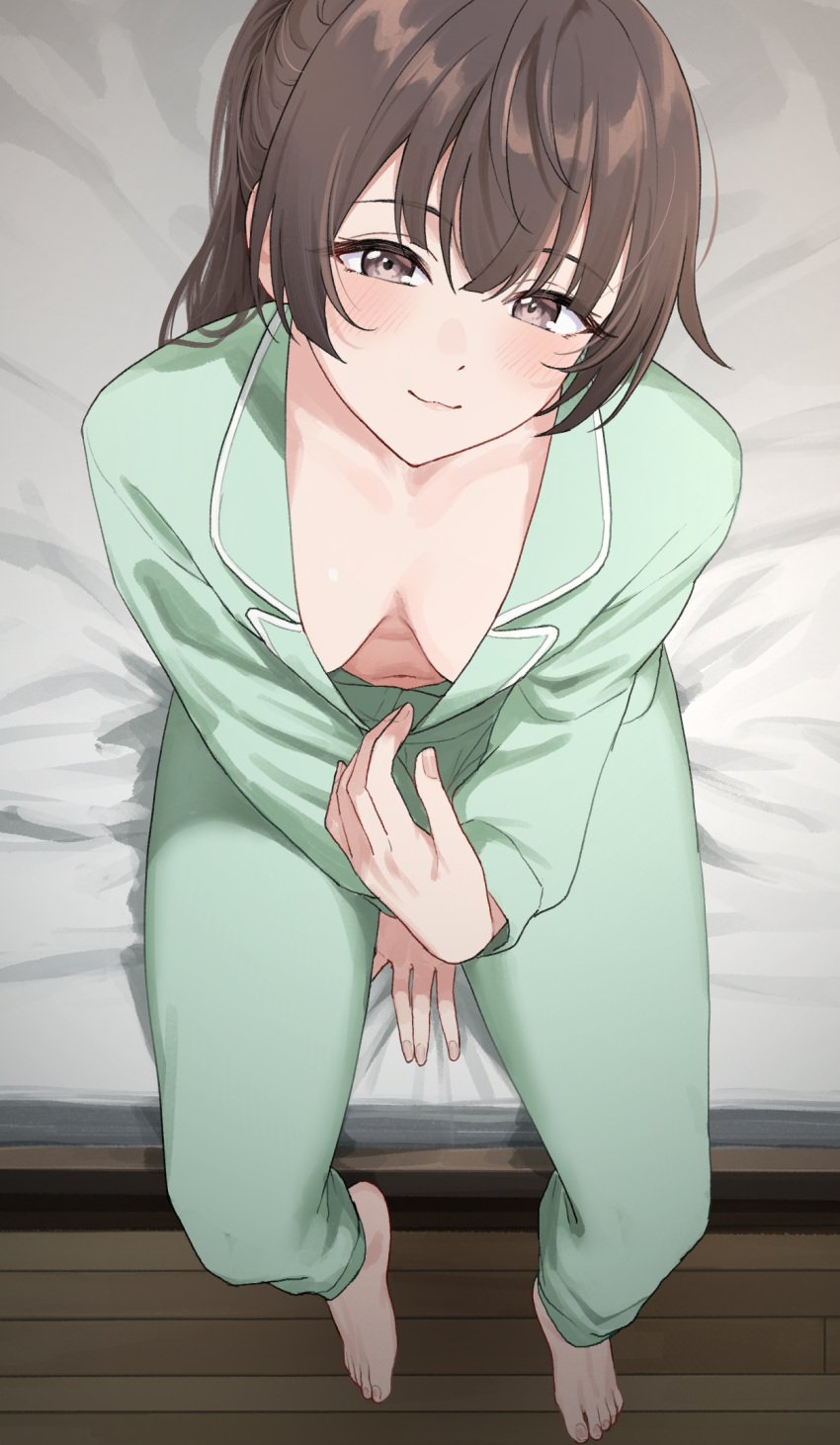 barefoot bed_sheet blush breasts breasts_apart brown_eyes brown_hair commentary feet female fingernails green_pajamas highres indoors light_smile long_hair long_sleeves looking_at_viewer medium_breasts nonbire on_bed pajamas shirt_tug sitting solo suou_yuki toes tokidoki_bosotto_roshia-go_de_dereru_tonari_no_arya-san