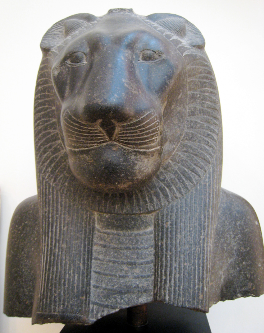 absurd_res ancient_art clothing deity egyptian egyptian_clothing egyptian_headdress egyptian_mythology felid female grandfathered_content hair headdress headgear headwear hi_res lion mammal mane mane_hair middle_eastern_mythology mythology nemes_(clothing) pantherine real rock sculpture sculpture_(artwork) sekhmet solo statue traditional_media_(artwork) unknown_artist