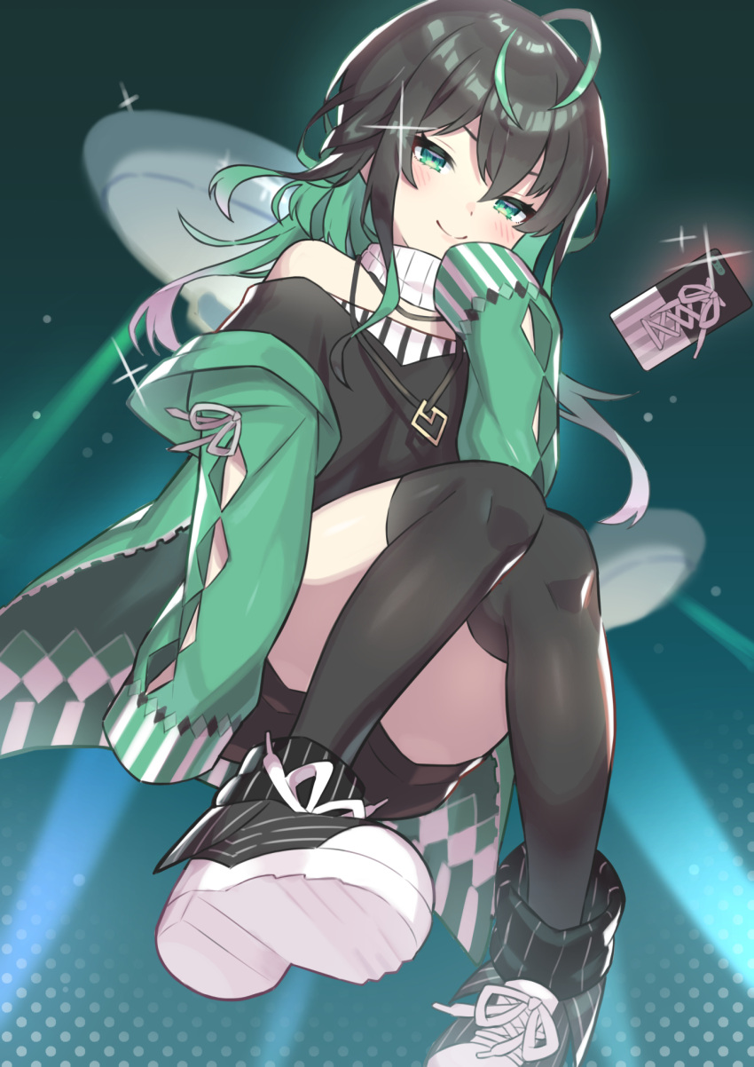 ahoge aotake_iro black_footwear black_hair black_shirt black_shorts cellphone female green_eyes green_hair green_sweater highres looking_at_viewer multicolored_hair nijisanji nijisanji_kr off_shoulder phone shin_yuya shirt shoes shorts sitting sleeves_past_fingers sleeves_past_wrists smartphone smile smug sneakers solo streaked_hair sweater thighhighs ufo virtual_youtuber