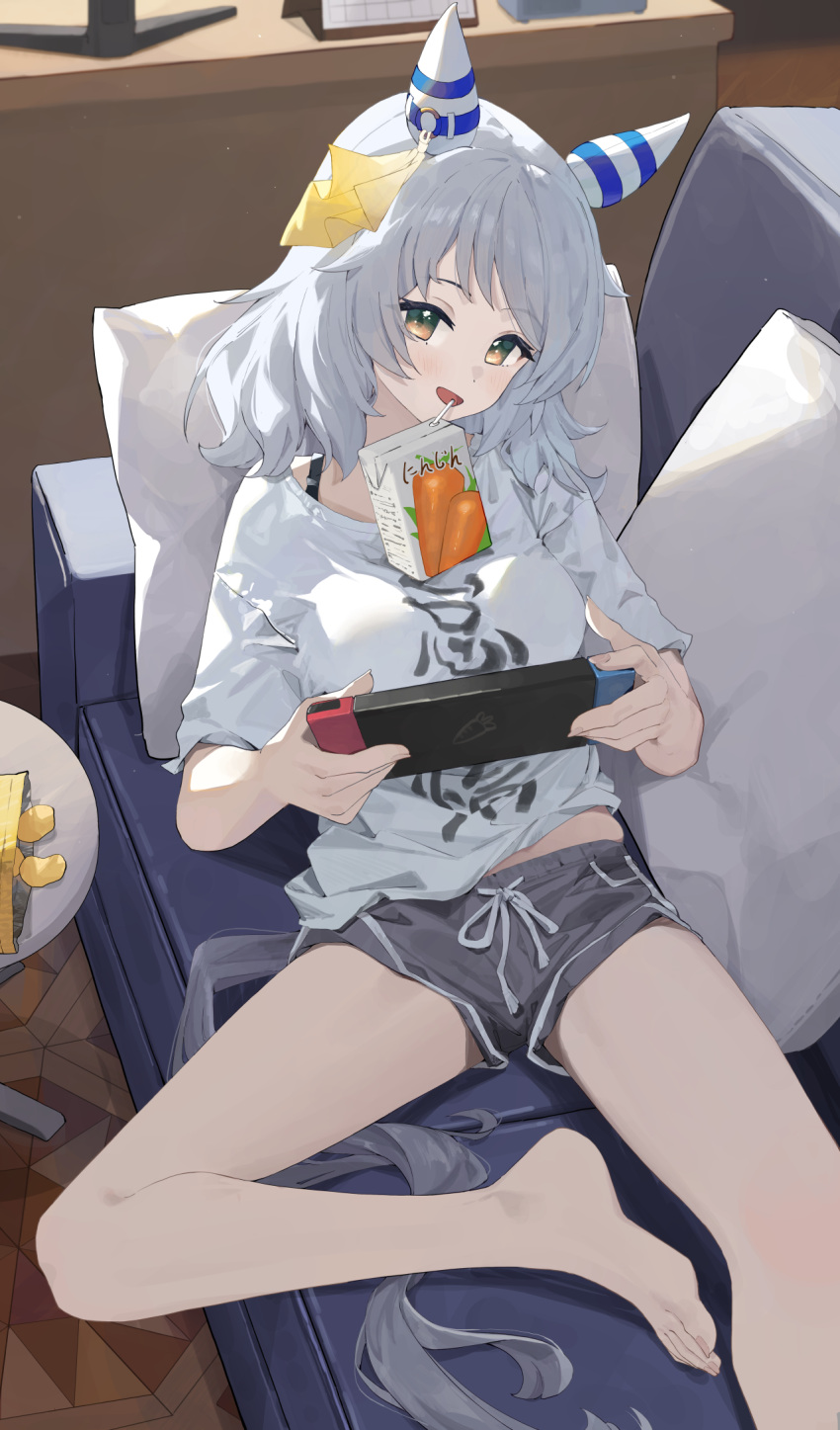 alternate_costume animal_ears bare_legs barefoot breasts brown_eyes commentary couch desk ear_covers ear_ornament feet female foot_out_of_frame grey_hair grey_shorts highres hishi_miracle_(umamusume) horse_ears horse_girl horse_tail indoors juice_box legs looking_at_viewer medium_breasts medium_hair ningen_gokko nintendo_switch on_couch open_mouth pillow shirt short_shorts short_sleeves shorts smile solo tail toenails toes umamusume white_shirt