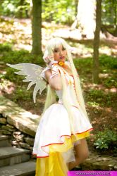  angelicstar blonde_hair blonde_hair bow chii chobits clamp cosplay dress lipstick long_dress long_hair makeup photo photo_shoot photograph pose posing red_lipstick short_twintails twintails twintails wings yellow_dress 