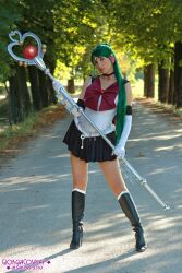  bishoujo_senshi_sailor_moon boots cosplay gloves green_hair highres long_hair meiou_setsuna photo photo_shoot pose posing red_eyes sailor_fuku sailor_pluto school_uniform serafuku staff tiara white_gloves 