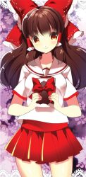  alternate_costume bad_id bad_pixiv_id border bow female gift hair_tubes hairbow hakurei_reimu holding lace lace_border long_hair orange_eyes ornate_border photoshop_(medium) pleated_skirt red_bow red_skirt roh_nam_kyung school_uniform skirt solo touhou valentine 