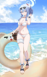  absurdres ako_(blue_archive) beach bikini blue_archive blue_eyes blue_hair blue_halo blush breasts cake_walker commentary day english_commentary eyewear_on_head female front-tie_bikini_top front-tie_top full_body hair_between_eyes halo highres innertube large_breasts long_hair looking_at_viewer navel ocean open_mouth outdoors sandals side-tie_bikini_bottom smile solo sunglasses swim_ring swimsuit water white_bikini 