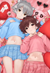  2girls absurdres animal_ear_fluff animal_ears blue_skirt blue_sweater brown_eyes brown_hair card cat_ears checkered_clothes checkered_skirt cropped_sweater expressionless from_above gradient_hair grey_hair hair_between_eyes hands_up head_tilt heart heart-shaped_eyewear heart-shaped_pillow highres indoors key kirarin369 light_blush light_smile looking_at_viewer lying midriff multicolored_hair multiple_girls navel notepad on_bed original pillow pink-framed_eyewear pink_skirt pink_sweater playing_card pleated_skirt red_ribbon ribbon short_hair skirt stuffed_animal stuffed_pig stuffed_toy sweater tamagotchi tamagotchi_(virtual_pet) wand white_hair 