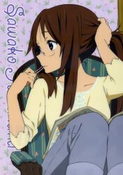  adjusting_hair brown_eyes brown_hair character_name clear_file_(medium) couch female glasses hand_in_own_hair highres horiguchi_yukiko imageboard_desourced indoors k-on! long_hair magazine_(object) mouth_hold non-web_source official_art pants profile rubber_band scan sitting solo yamanaka_sawako 