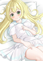  absurdres blonde_hair blush breasts closed_mouth commentary_request eyelashes female green_eyes head_on_pillow highres knee_up lillie_(pokemon) long_hair looking_at_viewer lying md5_mismatch on_back pillow pleated_skirt pokemon pokemon_sm seriponpoyon shirt short_sleeves skirt solo white_shirt white_skirt 