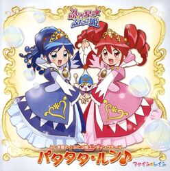  2girls album_cover blue_dress blue_hair character_name copyright_name cover creature dancing dress drill_hair fine_(futagohime) fine_(prominence_dress_up)_(futagohime) fine_(unviersal_princess)_(futagohime) frills fushigiboshi_no_futago_hime green_eyes long_sleeves magical_girl multiple_girls pink_dress red_eyes red_hair rein_(futagohime) scan shoes smile supportasse symmetry tiara twin_drills twintails wide_sleeves 