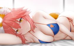  animal_ear_fluff animal_ears arind_yudha arm_up bare_arms bare_shoulders bikini blue_bikini blush breasts cleavage closed_mouth collarbone commentary fate/grand_order fate_(series) female fox_ears fox_girl fox_print fox_tail hair_between_eyes halterneck highres indoors large_breasts lips looking_at_viewer lying navel oerba_yun_fang on_side orange_trim pink_hair side-tie_bikini_bottom skin_fang smile solo stomach string_bikini swimsuit tail tamamo_(fate) tamamo_no_mae_(swimsuit_lancer)_(fate) tamamo_no_mae_(swimsuit_lancer)_(third_ascension)_(fate) thighs yellow_eyes 