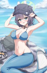  absurdres arms_up backpack bag bikini black_headwear blue_archive blue_bikini blue_eyes blue_hair blush breasts commentary_request dark_blue_hair day female halo highres looking_at_viewer medium_breasts medium_hair mermaid_costume monofin navel ocean official_alternate_costume outdoors parted_lips poorunii rock saki_(blue_archive) saki_(swimsuit)_(blue_archive) sitting solo stomach swimsuit variant_set watch wristwatch 