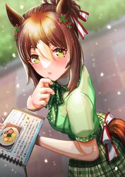  animal_ears blurry blurry_background blush bow brown_hair closed_mouth clover_hair_ornament commentary_request female fine_motion_(umamusume) green_bow green_shirt green_skirt hair_between_eyes hair_bun hair_ornament highres holding holding_menu horse_ears horse_girl horse_tail looking_at_viewer menu multicolored_hair otono_(bkt4b) outdoors plaid plaid_skirt polka_dot polka_dot_bow shirt short_hair short_sleeves skirt solo sparkle streaked_hair tail tail_through_clothes umamusume white_hair 