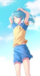  1boy arms_up blue_hair blue_shorts fujimura_hinami hair_over_one_eye heterochromia highres inazuma_eleven_(series) inazuma_eleven_go kazemaru_ichirouta male_focus midriff ponytail red_eyes shorts soccer_uniform solo sportswear yellow_eyes 