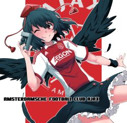  aerokinesis afc_ajax black_hair black_wings camera clothes_lift clothes_writing commentary_request feathered_wings feathers female fujii_jun hat hat_ribbon looking_at_viewer one_eye_closed red_eyes ribbon shameimaru_aya shirt skirt skirt_lift smile soccer_uniform solo sportswear tokin_hat touhou wind wind_lift wings 