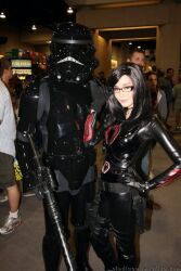  adjusting_glasses alodia_gosiengfiao baroness black_hair bodysuit cobra cosplay g.i._joe glasses hand_on_hip helmet smile snake soldier star_wars stormtrooper 