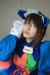  2k 2k-tan adjusting_glasses cosplay couch female glasses gloves highres nami os os-tan photo red_couch red_upholstery sitting solo thigh-highs thighhighs white_gloves 