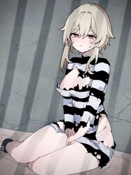  blonde_hair blush breasts cleavage closed_mouth commentary cuffs female genshin_impact indoors kuromu_shado large_breasts long_sleeves lumine_(genshin_impact) no_pupils on_floor prison_cell prison_clothes restrained shackles shirt short_hair_with_long_locks sidelocks sitting solo striped_clothes striped_shirt torn_clothes torn_shirt yellow_eyes yokozuwari 