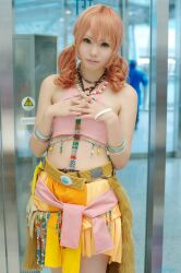  belt bracelet cosplay door female female final_fantasy final_fantasy_xiii jewelry midriff necklace oerba_dia_vanille oerba_dia_vanille_(cosplay) pink_shirt shirt skirt solo standing twintails window 