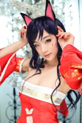  ahri animal_ears black_hair cat_ears cosplay female fox_ears korean league_of_legends long_hair photo red_eyes spiral_cats 